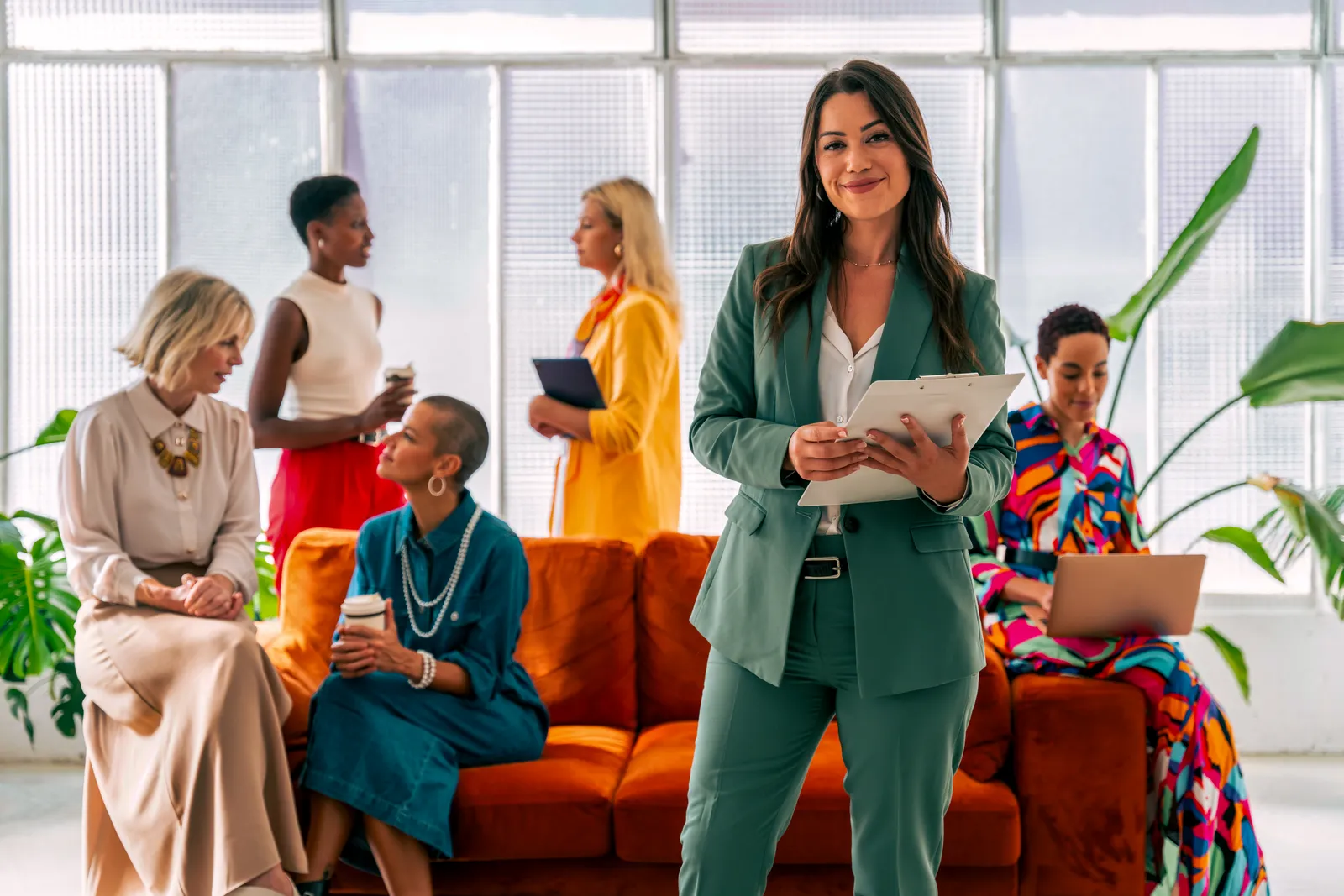 A group of businesswomen meeting and planning together.