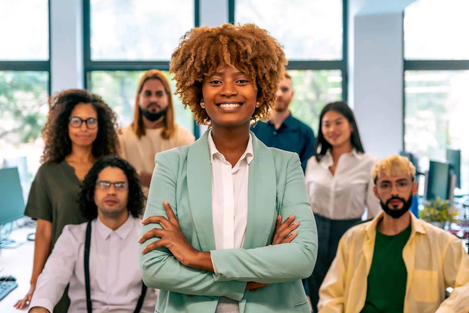 Team members working together in a modern workplace.