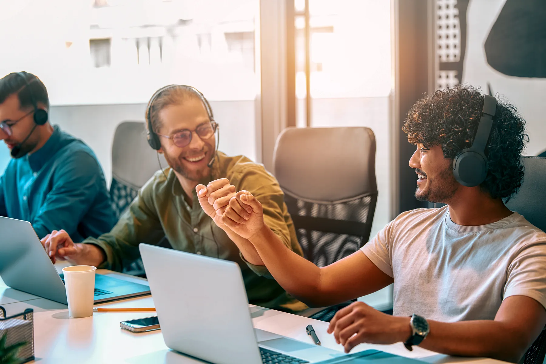 Team members collaborating in a modern office.